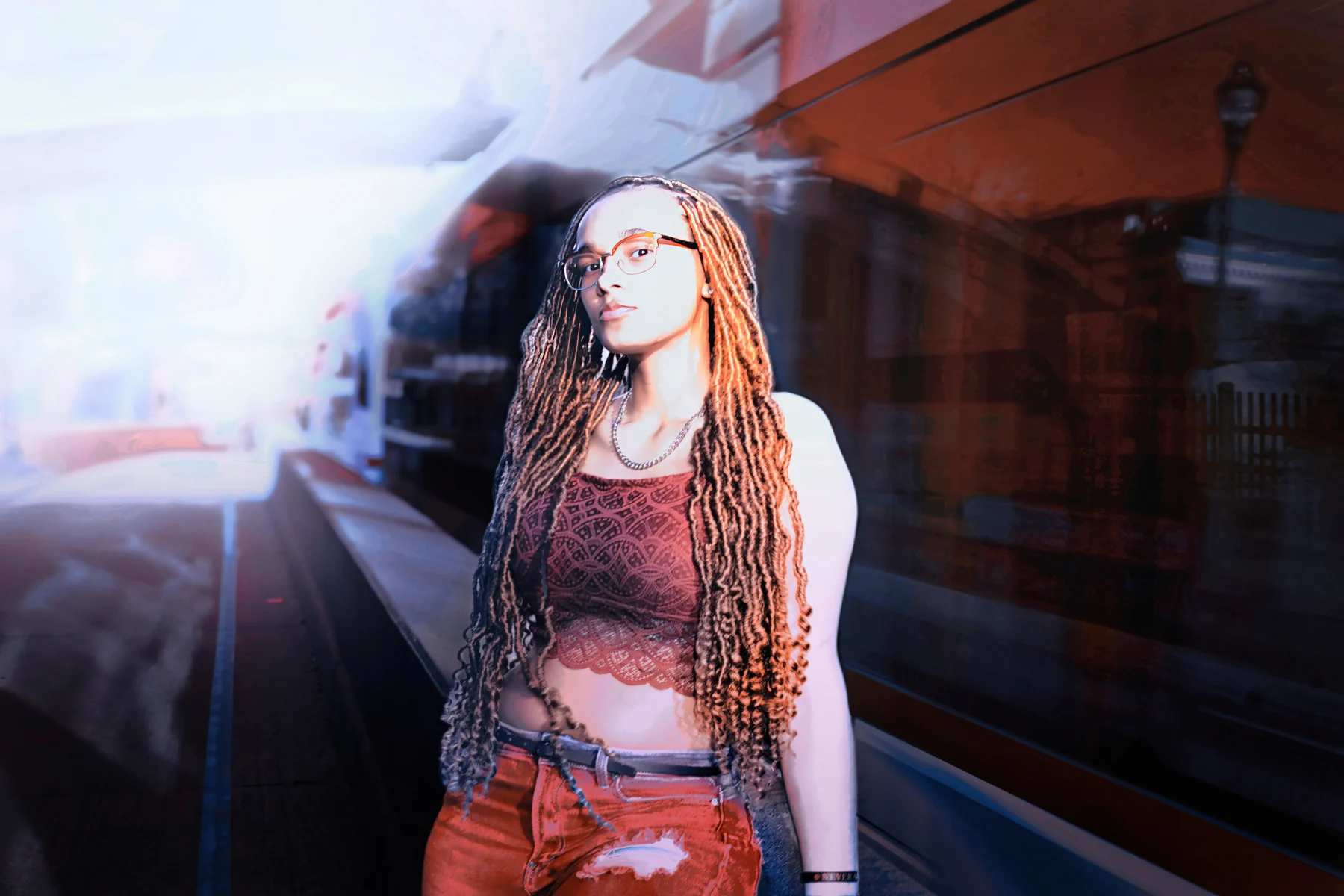 Platform, red, and a train going by, by Bryan Korth